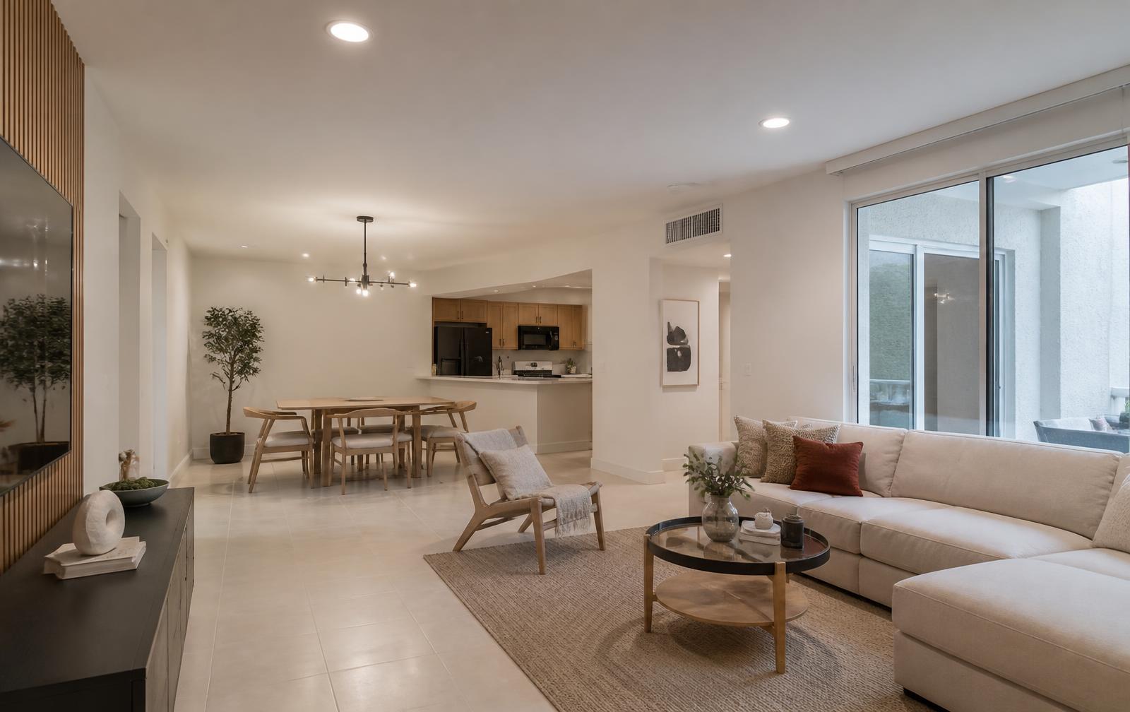 Renovated interior living space with new flooring, trim and paint